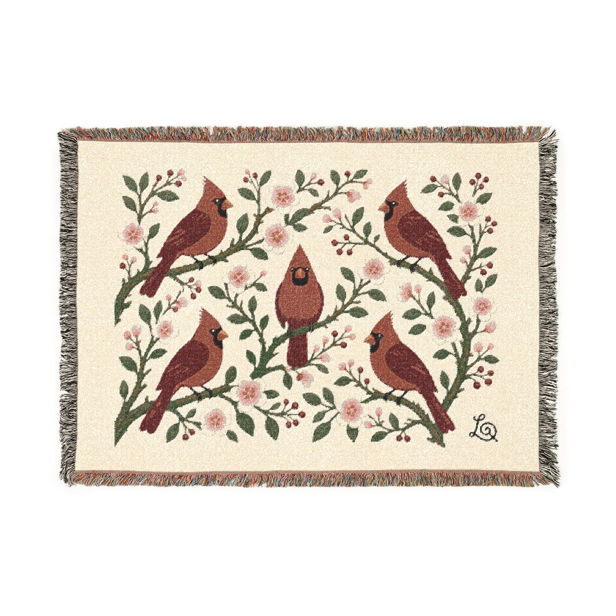 &ldquo;Winter Cardinals & Blossoms&rdquo; 100% Cotton Woven Jacquard Throw Blanket by Lynn Qwik styled on a warm living room sofa